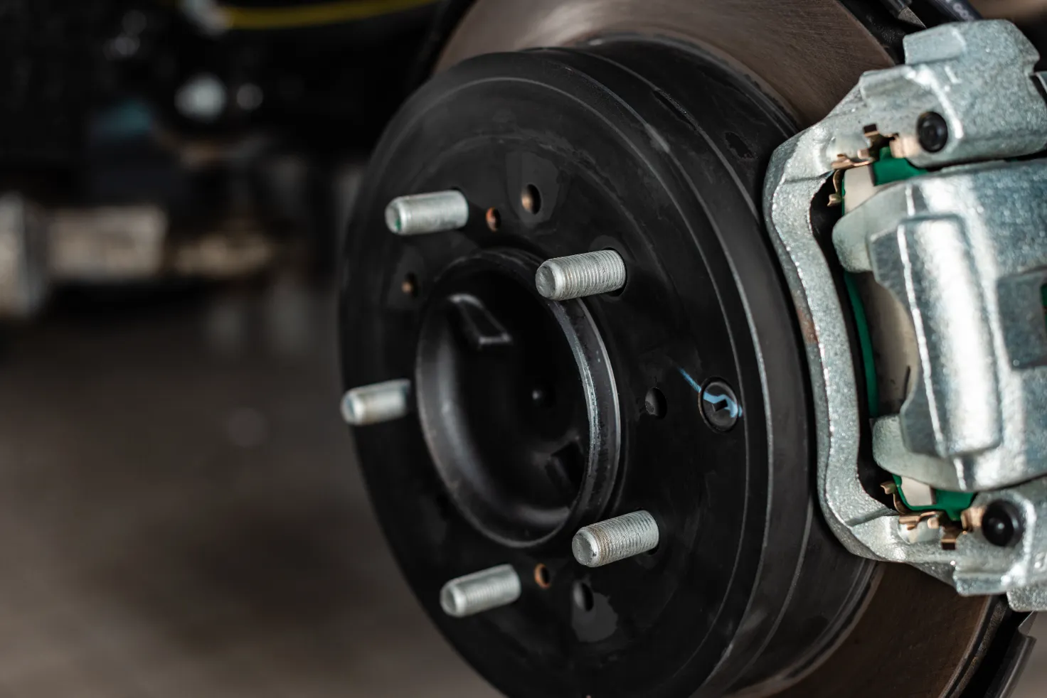 A closeup view of a truck's disk brakes.